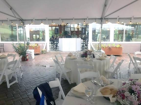 “It’s a crazy time for all these brides”: Sue-Ann Hansen, event coordinator, said the Fairgrounds Conservatory offers tent and barn options for weddings on short notice.