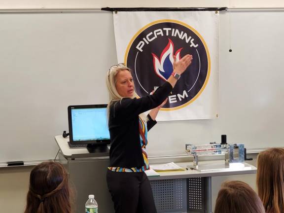 Stacey Yauch of Picatinny Arsenal talks to a group of girls about armament components during a Women in STEM event held on Thursday, Jan 9, 2020 at Sussex County Community College. Over 200 students attended the day-long symposium. (Provided by Jim Hofmann)