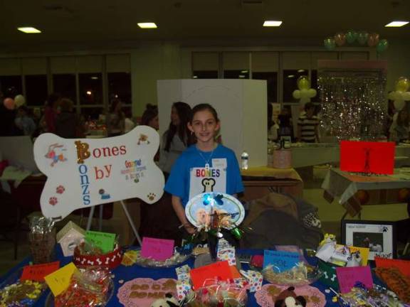They mean business Sierra Dunn, 12, owner of Bones By Bones. The company sells gourmet treats for dogs and humans.