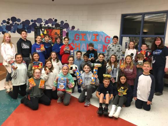 As part of the Giving Challenge, Sparta Middle School students have helped stock the food pantry located at 83 Spring Street in Newton.