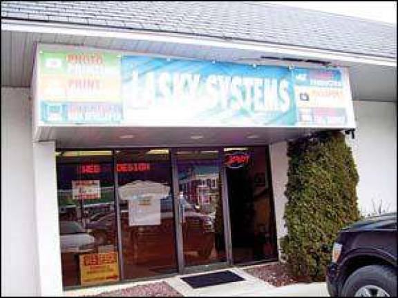 Lasky Systems brings high tech copy, printing, photo, Web design to Andover Lasky Systems brings high tech copy, printing, photo, Web design to Andover
