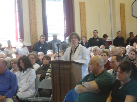 Overflowing crowd voices support for local hospital Dr. Denise Autotte, who practices at St. Clares Sussex campus as well as has a private practice in Hamburg, speaks in favor of saving the hospital.
