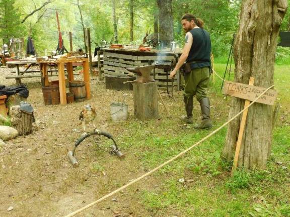 Knights and faeries roman the woods of Sparta The Hawk Guild at the Sparta Renaissance Festival, Saturday, September 15, 2018.