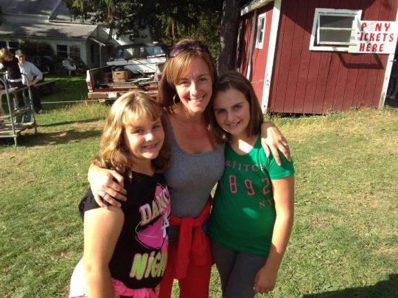 Mommy & Me Contest Michelle Palmer of Monroe Michelle with her daughters Nicole and Amanda Palmer. "Best Mother's Day present ever...my girls."
