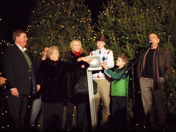 The McCracken Family pull the switch to turn on the tree lights. The 22nd Annual C. Edward McCracken Festival of Lights took place in Newton, New Jersey on Saturday, November 16, 2013. Newton Medical Center was the location of the event.