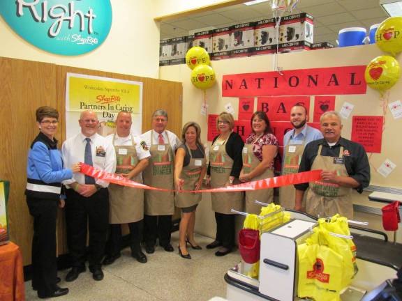 Dignitaries help ShopRite fight hunger Pictured are, from left, Cathie Miller (Consumer Affairs Coordinator), Don Morgan (Assistant Store Manager), Sheriff Michael Strada, Gary Chiusano (Sussex Co. Surrogate), Tammie Horsfield (President of Sussex Co. Chamber of Commerce), Carol Novrit (Director of Sussex Co. Social Services), Susan Bowman (Assistant Director of Sussex Co. Social Services, Wayne Levante (Newton Town Council), and Marc De Matteo (Meat Department Manager and Partners in Caring Captain)