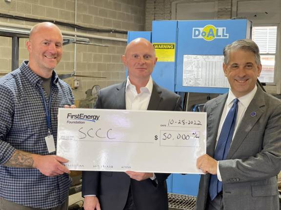 Pictured left to right: Jason Fruge, dean of Technical Education at SCCC, Rich Rebisz, regional External Affairs Consultant for JCP&amp;L FirstEnergy Foundation and Stan Kula, director of the SCCC Foundation stand in the Welding area of the McGuire Technical Education Center where much of the program materials will be purchased for students.