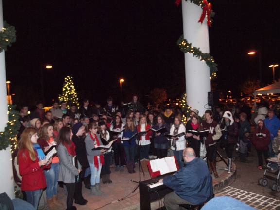 The Newton High School Choir sing. The 22nd Annual C. Edward McCracken Festival of Lights took place in Newton, New Jersey on Saturday, November 16, 2013. Newton Medical Center was the location of the event.