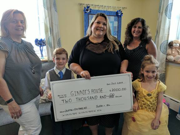 Twins donate to Ginnie's House Justin and Gia Pavelko are 6-year-olds who recently celebrated a birthday by donating funds to Ginnie's House in Newton, rather than accepting gifts. Ginnie's House is a children's advocacy center. The twins' mother, Jennifer (at left), hopes other parents will consider encouraging children to turn their birthdays into fundraisers for nonprofits. (Photo provided)