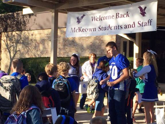 KRHS teams visit elementary schools Cheerleaders and football players greet students coming into school on Friday at the McKeown Elementary School