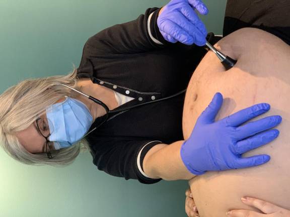 ‘We can’t help everybody’ Midwife Susanrachel Birdie Condon with her client Anique Nicholson.