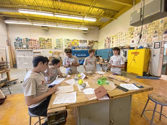 Students build water rockets Sussex County Charter School students, from left, Trevor Weinberg, Lar Gustafson, Jackson Tilley, Andrew Besthorne and Eric Ruiz design and build their rocket during the event at Wallkill Valley Regional High School.