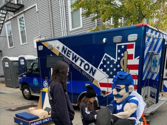 From left, Newton First Aid Squad volunteers Jennifer Ellsworth and Jocelyn Reynolds have a Seton Hall Pirate on a stretcher.