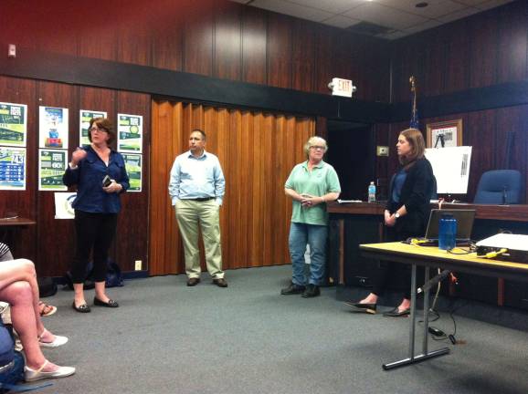 EPA presents new remediation plan for Mansfield Superfund site From left, Stanhope resident Donna Griff asks a question EPA representaticves Diego Garcia, Pat Seppi and Anne Rosenblatt