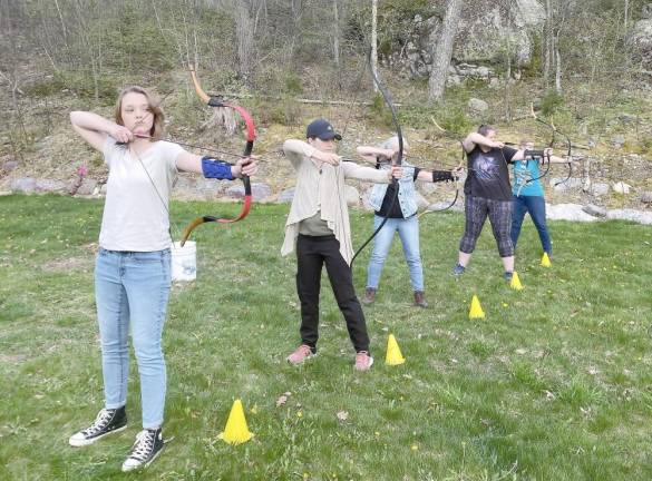 Wildish Way helps empower women through archery and animals Attendees of Meghan Hindi’s archery class.