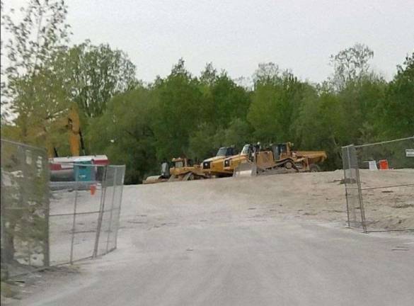 Construction begins on glass recycling facility Heavy equipment sits ready to go to work on the site of the future Pace Glass Recycling, Inc. processing facility on Limecrest Road in Andover Township. Photos by mandy Coriston