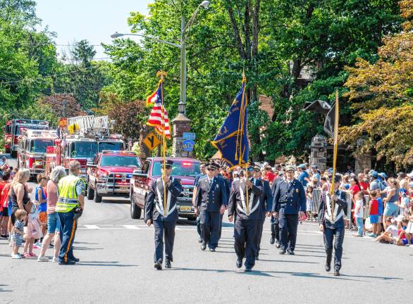 Sparta. Fourth of July events Sparta firefighters march in the Fourth of July parade on Friday, July 4 in Sparta. (Photos by Nancy Madacsi)