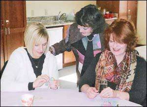 Group sews for grieving children Group sews for grieving children