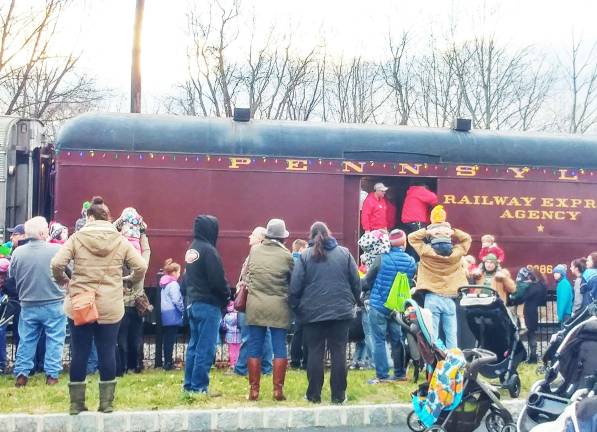 Toy Train makes Sparta stop The train arriuves to an expectant crowd Photos by Meghan Byers