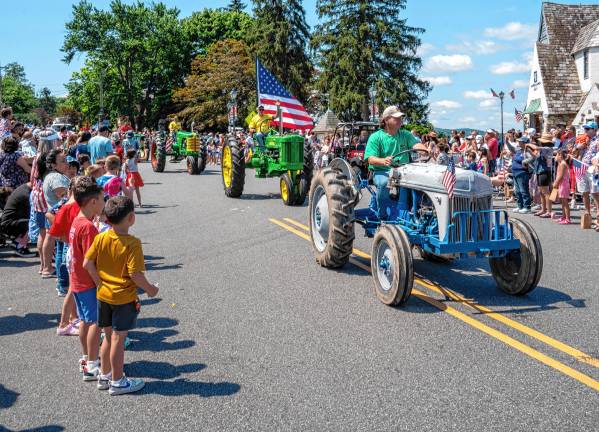 Sparta. Fourth of July events Antique tractors are driven in the parade.