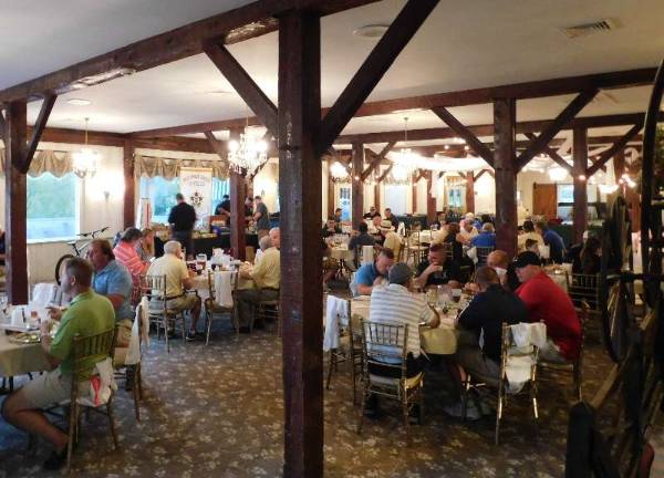 Andover police step up to run Bosworth Memorial golf outing Golfers enjoy dinner at the Farmland Golf and Country Club during the 21st annual William Bosworth, Jr. Memorial Golf Outing.