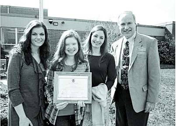 Mottola wins Caring Award From left: Byram Intermediate School psychologist Bettyann DeMarco, award recepient Elizabeth Mottola, Byram Intermediate School guidance counselor Nicole Lanka and principal Joseph Novak.