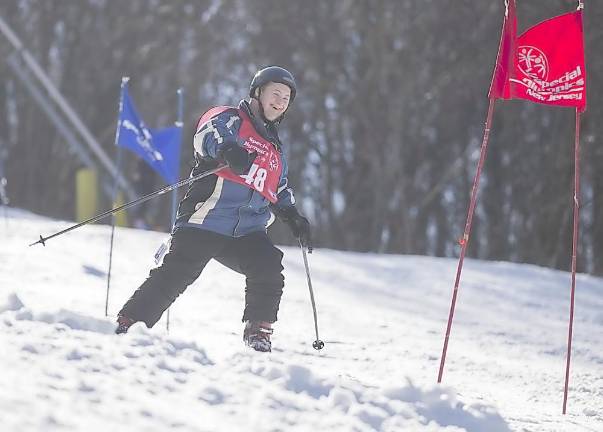 An athlete skis down the slope at Mountain Creek.