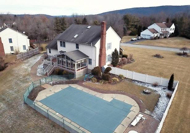 Spacious center hall colonial has in-ground pool Spacious center hall colonial has in-ground pool