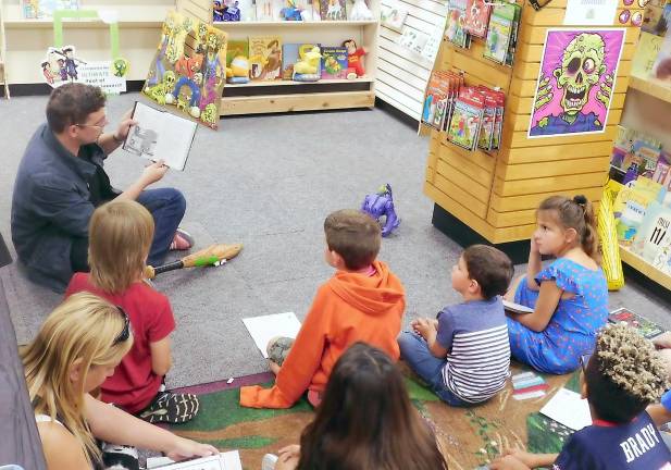 Kids 'touch zombies' and play Mad Libs with author Max Ballier at Sparta Books Max Brallier reads to young fans from his new book The Last Kids on Earth and the Midnight Blade at Sparta Books on Tuesday, Sep 17, 2019. Brallier visited Sparta to celebrate the debut of the book and the Netflix show based on his Last Kids on Earth series.