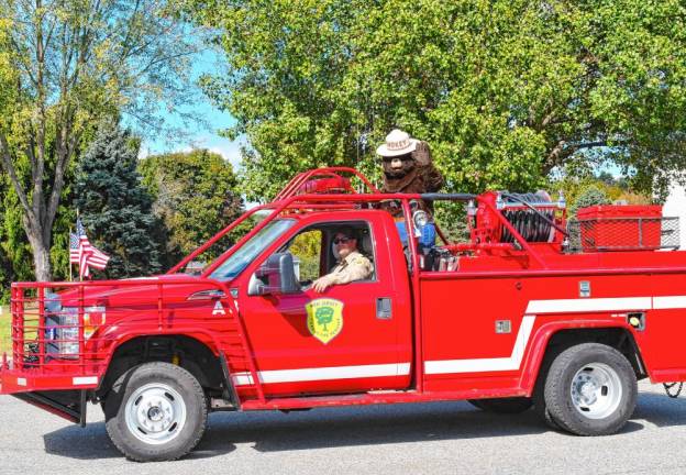 Photos: Sussex County Firemen’s Association Inspection Day & Parade Smokey the Bear rides in the parade. He is celebrating his 80th birthday this year.