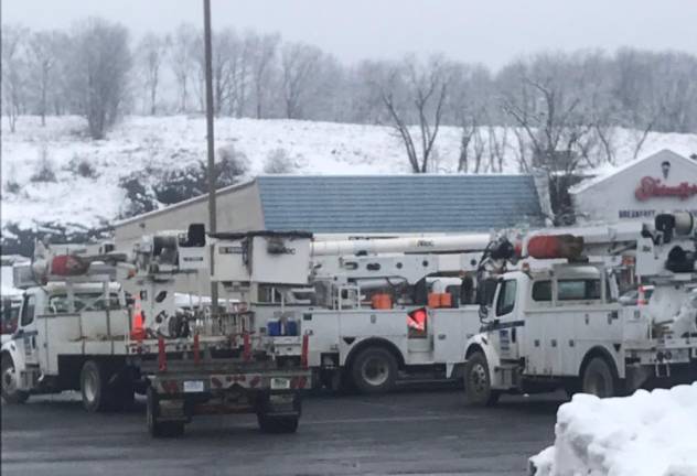 About two dozen power trucks currently waiting in Sussex County Mall lot in Newton for the nod to go out on the road Wednesday as residents all over the county grow more and more frustrated and remain without power.