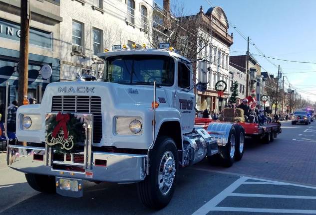 2019 Holiday Parade Terco Construction’s Mack flatbed hauls a Christmas scene during the Annual Holiday Parade in Newton on Saturday, Nov 30. 2019.
