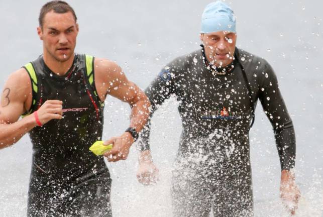 Pair of swimmers emerging from the lake in the 2017 triathlon Photos provided by PIA