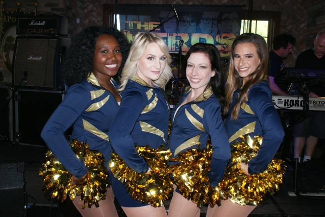 Reunification party for Sparta youth football Sussex Stags Dance Team shows it support of Sussex County Youth Football & Cheerleading. From left, Director Kari Brantner, Assistant Director Cary Holm, Captain Tamara S. and Alycia D.