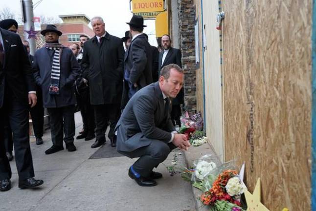 Standing up to anti-Semitism U.S. Rep. Gottheimer pays respects outside JC Kosher Deli, the site of last week’s deadly anti-Semitic attacks in Jersey City.