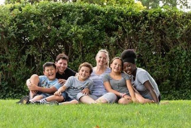 Thank you from the Fresh Air Fun Kyle (far left), age 11, of Brooklyn, and 12-year old Abena (far right), of the Bronx, visited the Rivera family of Garden City, NY for two summers.