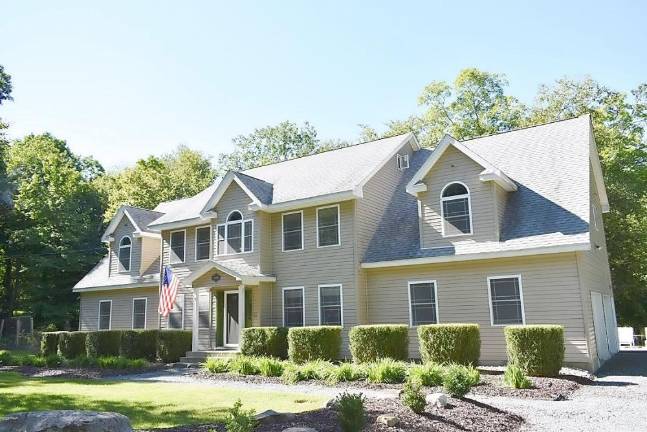 Upscale four-bedroom colonial has lake access Upscale four-bedroom colonial has lake access