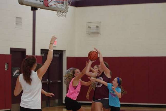 Basketball players learn skills at camp Merriam Avenue School in Newton, NJ hosted summer basketball camp from July 28 to Aug. 1. The camp taught the fundamentals of the game and was conducted by the Newton Junior Athletic League. Players from the Newton High School girls basketball team were counselors.
