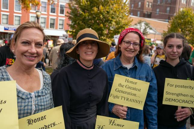 ’No Kings’ rally draws estimated 600 people to Newton Women over time: Jeanne Apryesz, Amy Lehne, Laura Lorben