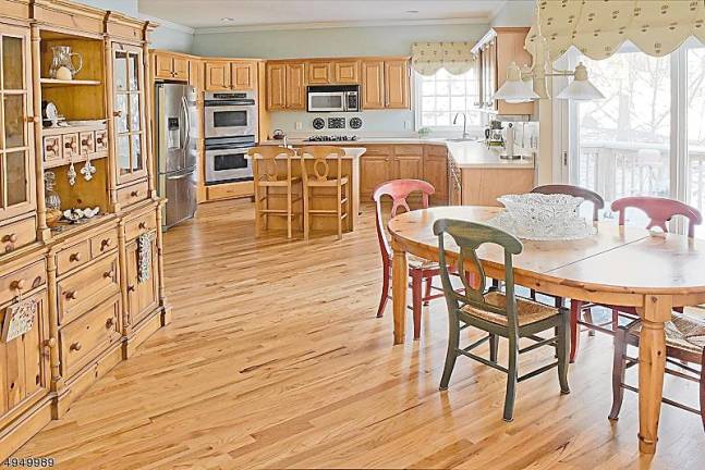 Stately brick-front colonial at Woodcrest Lake offers privacy Stately brick-front colonial at Woodcrest Lake offers privacy