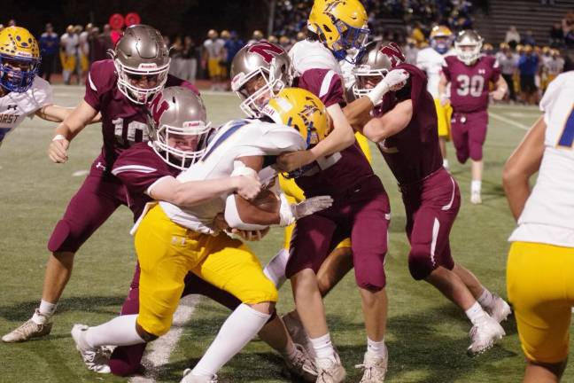 Newton, Sparta, Sussex Tech advance to semis in playoffs Newton defenders pounce on a Lyndhurst ball carrier.