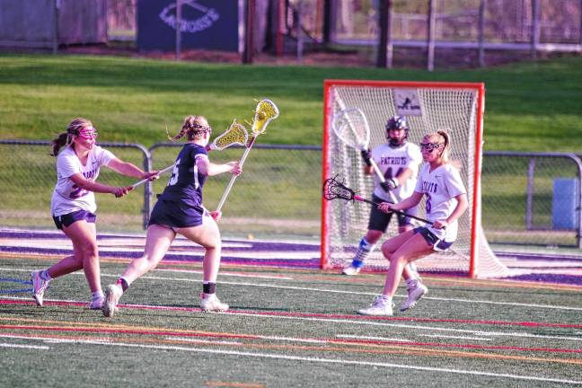 Patriots win 2 silvers in H/W/S Championships LV3 The Patriots defend their goal from an incoming Pope John player.