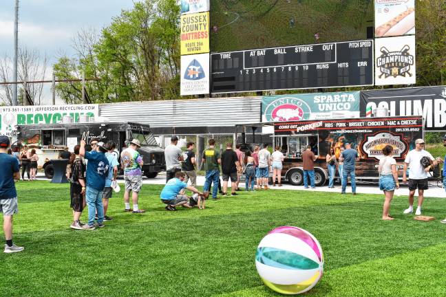Miners open 10th season <b>People line up for beer.</b>