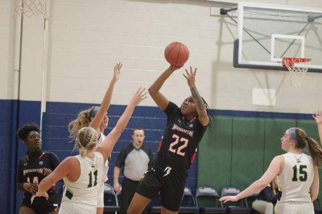 Northampton's Xenia Gillis (22) leaps during a shot. She scored 25 points in the game.