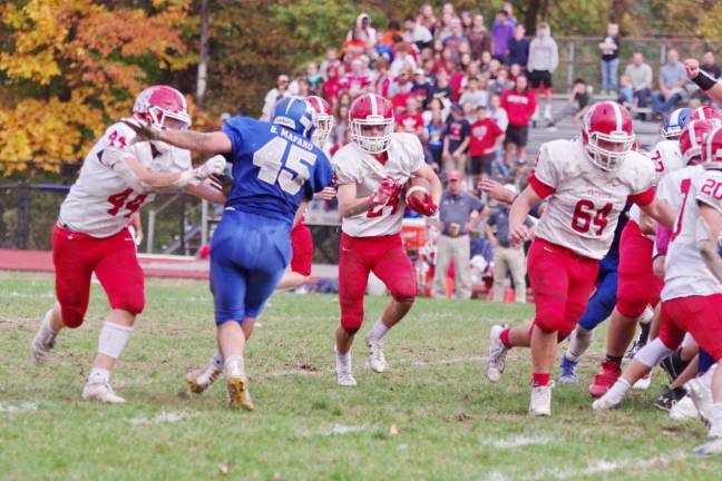 Lenape Valley ball carrier Drew Togno moves towards an opening in the Kittatinny defense in the second half.