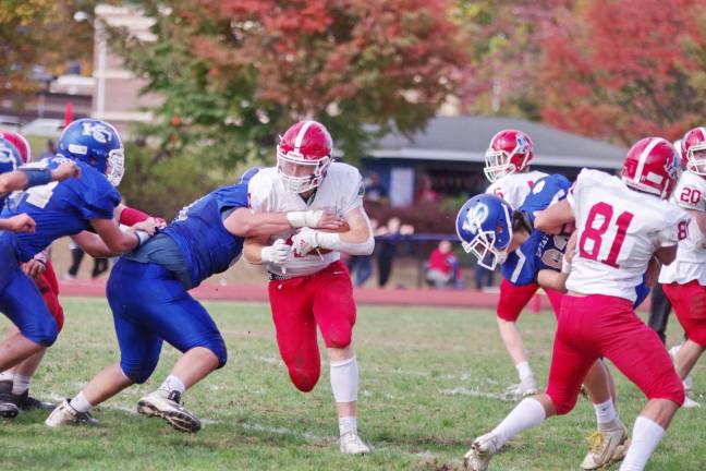 Lenape Valley ball carrier Nick Molinari moves towards an opening in the Kittatinny defensive wall in the first half. Molinari rushed for 1 touchdown.