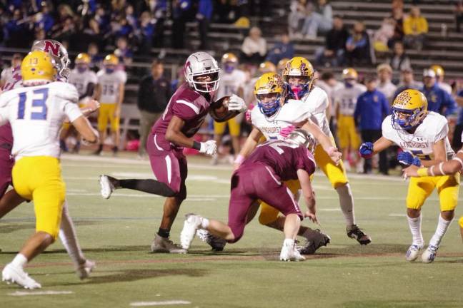Newton, Sparta, Sussex Tech advance to semis in playoffs Newton ball carrier DeMarius Posey is on the move in the first half.