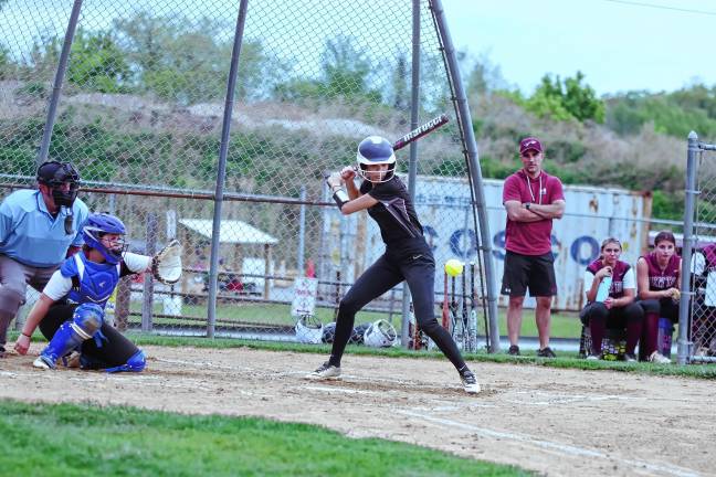 Braves beat Belvidere Wallkill Valley batter Madison Molta watches the ball approach in the first inning.