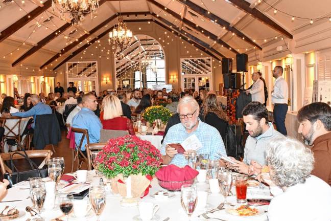 Grape Expectations fundraiser The Samaritan Inn’s 20th annual Grape Expectations fundraiser is held Sunday, Sept. 29 at the Lake Mohawk Country Club in Sparta. It included a wine tasting, silent and live auction, dinner and music. (Photos by Maria Kovic)