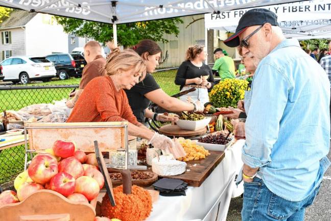 Photos: Taste of Newton Restaurants and culinary businesses offer samples of their cuisine at Taste of Newton on Monday, Sept. 9 in the Central Plaza Parking Lot. (Photos by Maria Kovic)